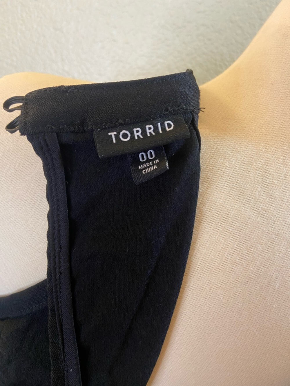 Torrid Caged High Neck
Peplum Top in black. Size:00(M) - Picture 8 of 11